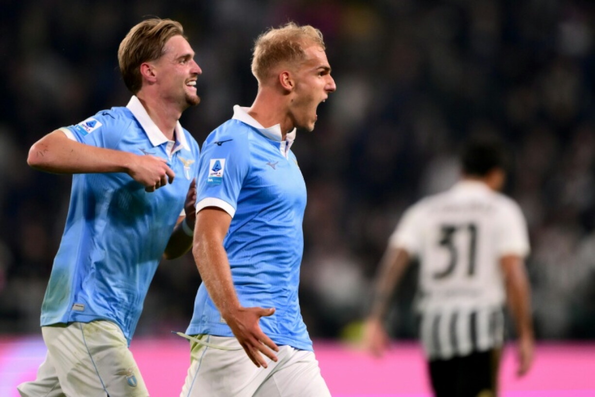Gustav Isaksen (C) shows his satisfaction after scoring Lazio's second goal at Juventus
