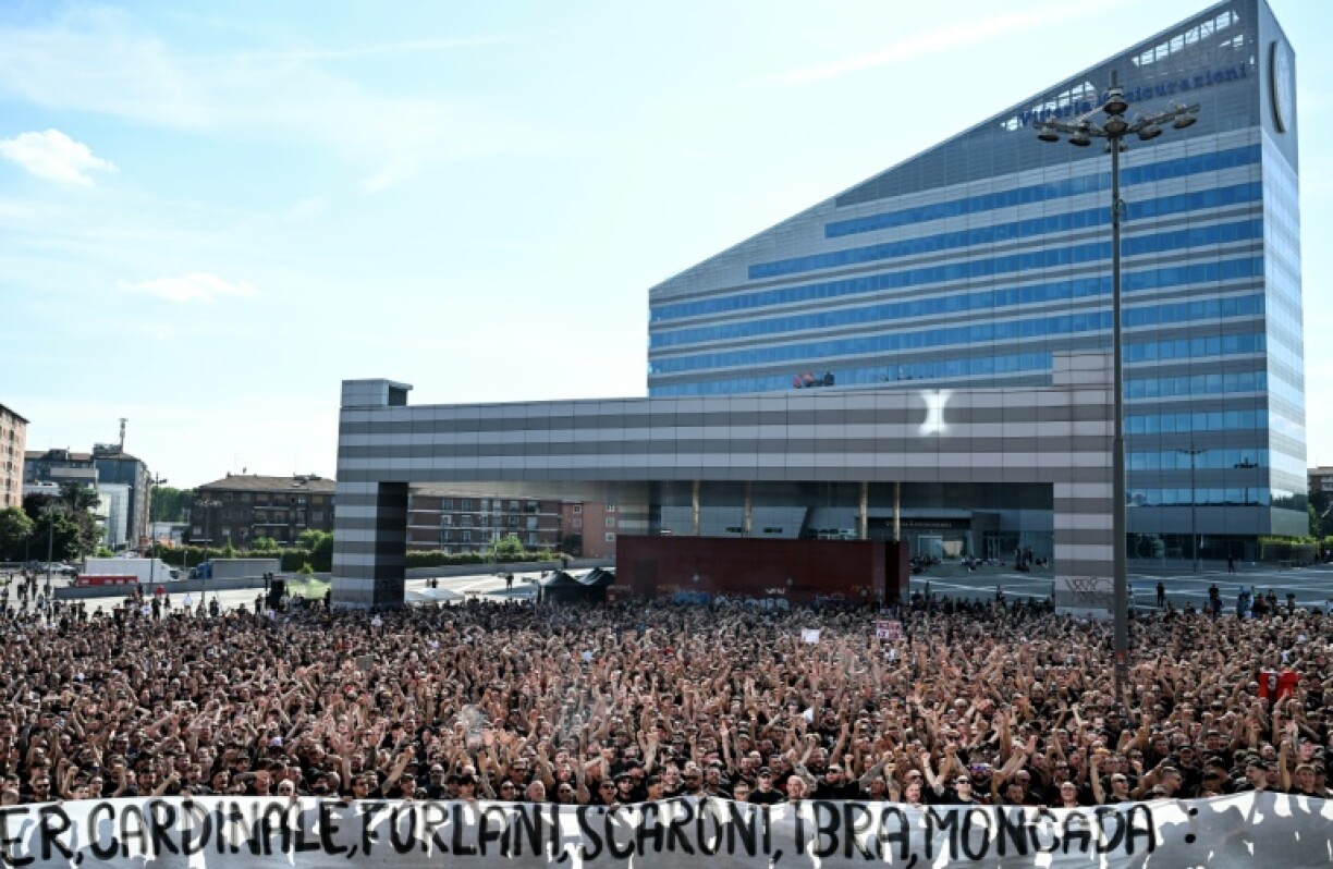 AC Milan supporters protest against the club's management outside the Casa Milan headquarters