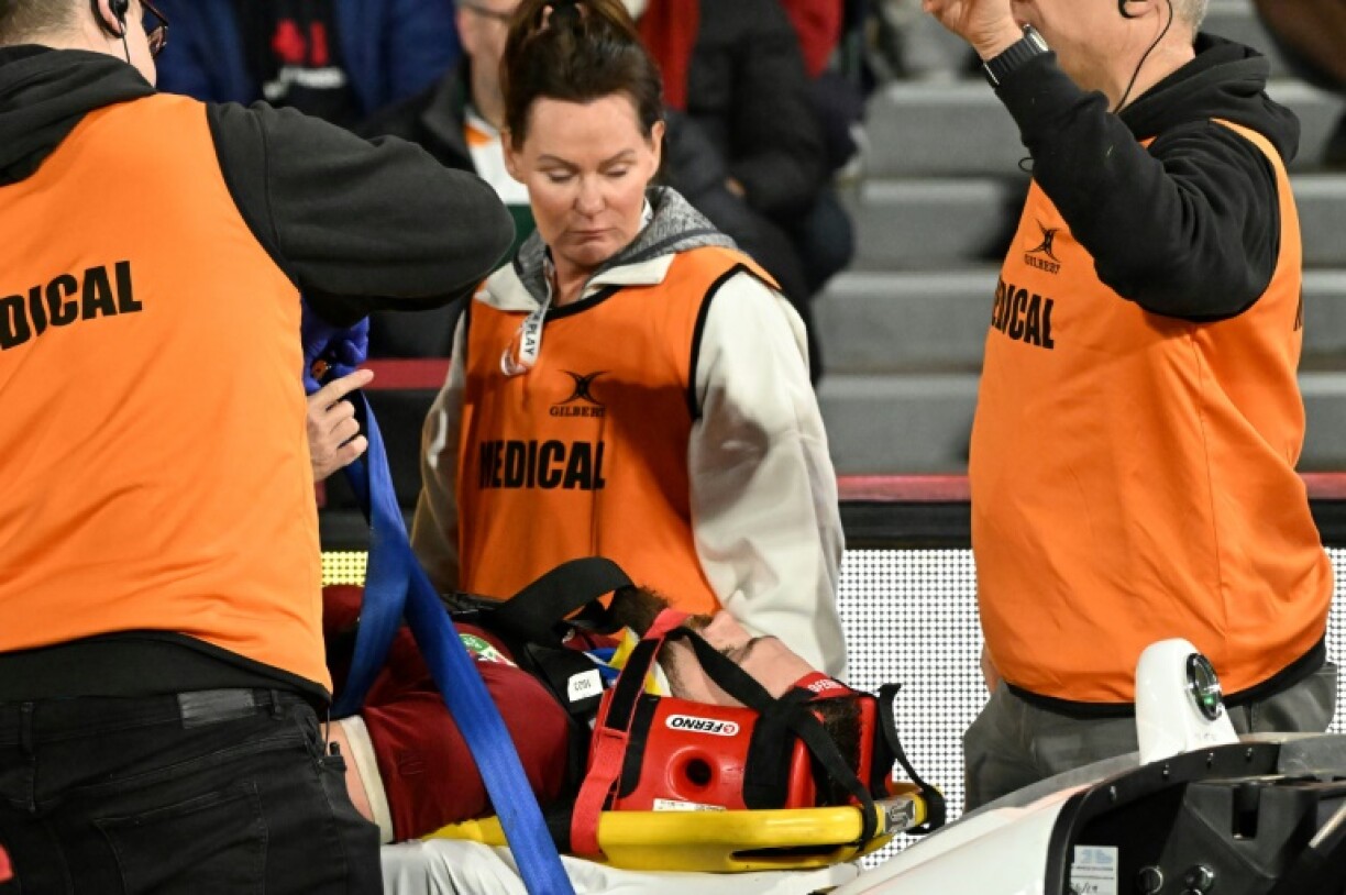 British and Irish Lions' Luke Cowan-Dickie is stretchered off the field after a head injury in Adelaide