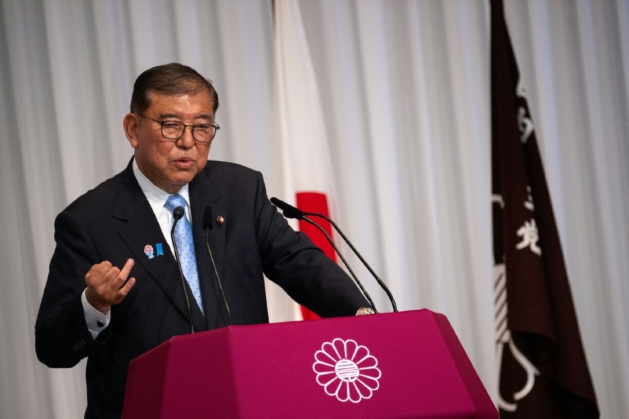 Japanese Prime Minister Shigeru Ishiba says he intends to stay in power even after his coalition suffered an 'extremely regrettable' election result