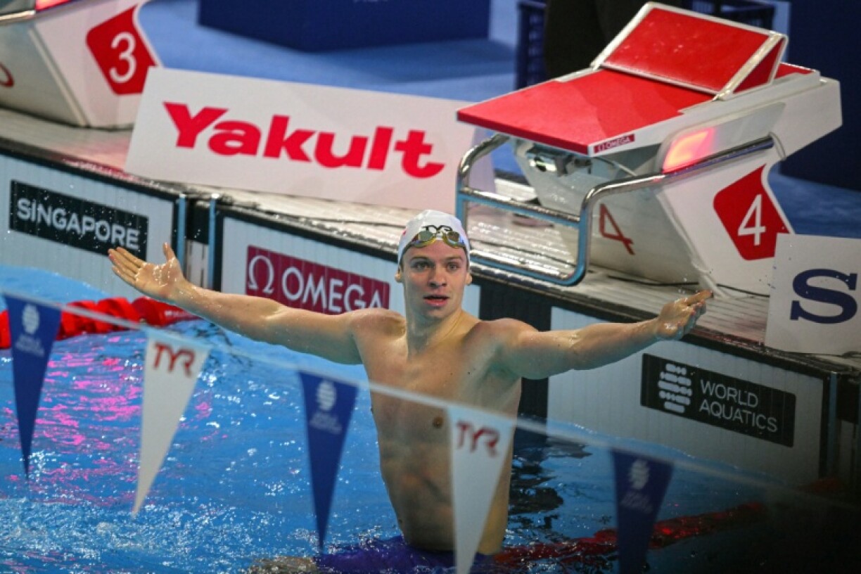 France's Leon Marchand broke the 200m medley world record at swimming's world championships in Singapore