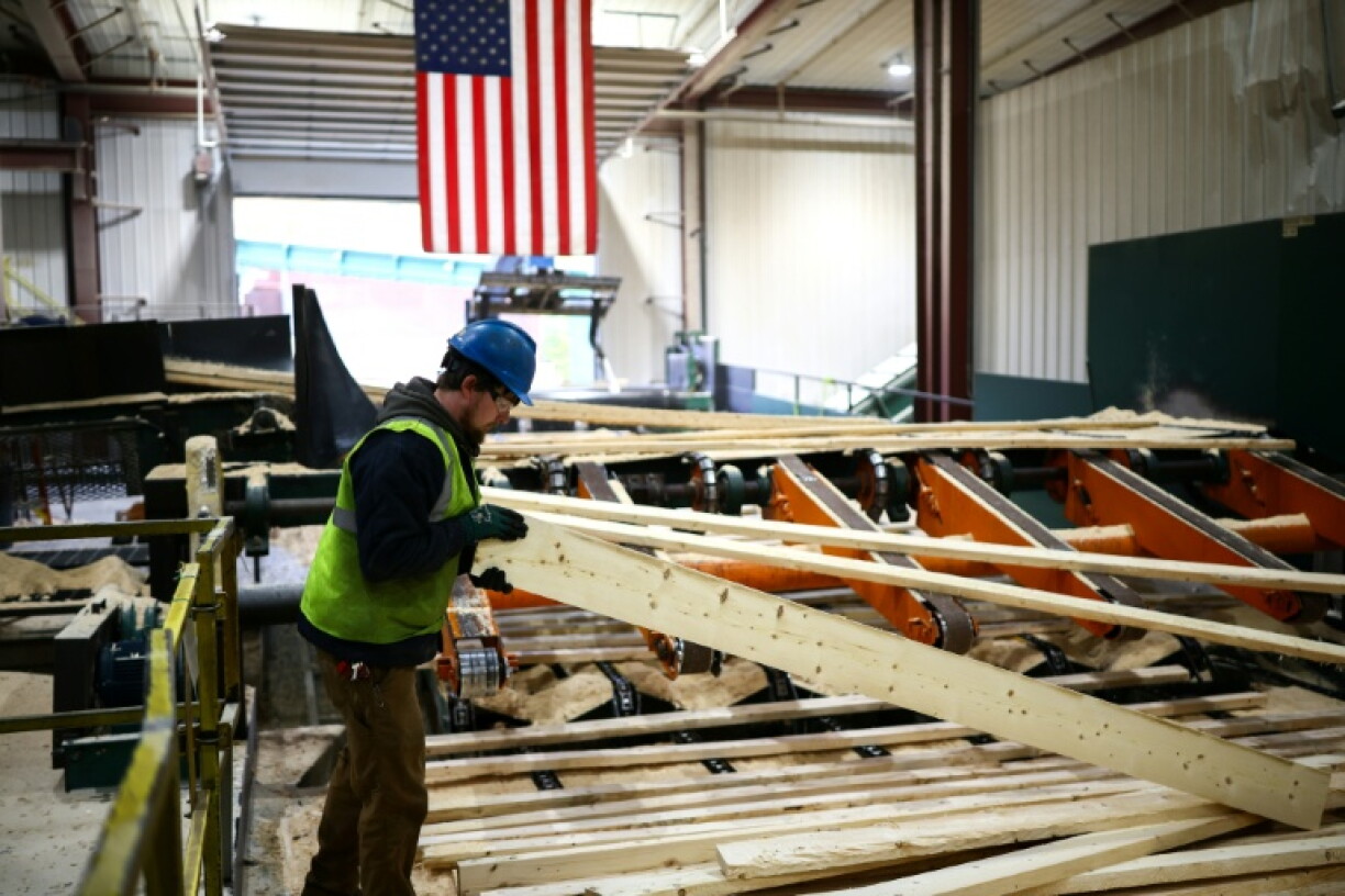 Softwood is processed at the Pleasant River Lumber Company's main sawmill in Enfield, Maine, where the firm's owners believe US tariffs are appropriate protective measures against Canada's subsidized wood processing industry