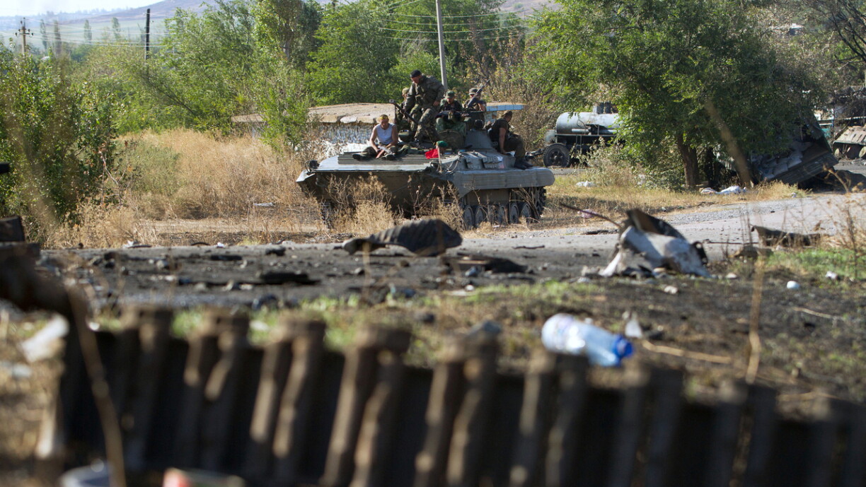 Pro-russesch Separatisten op engem Schützepanzer no der Schluecht vun Ilowjask, 4. September 2014