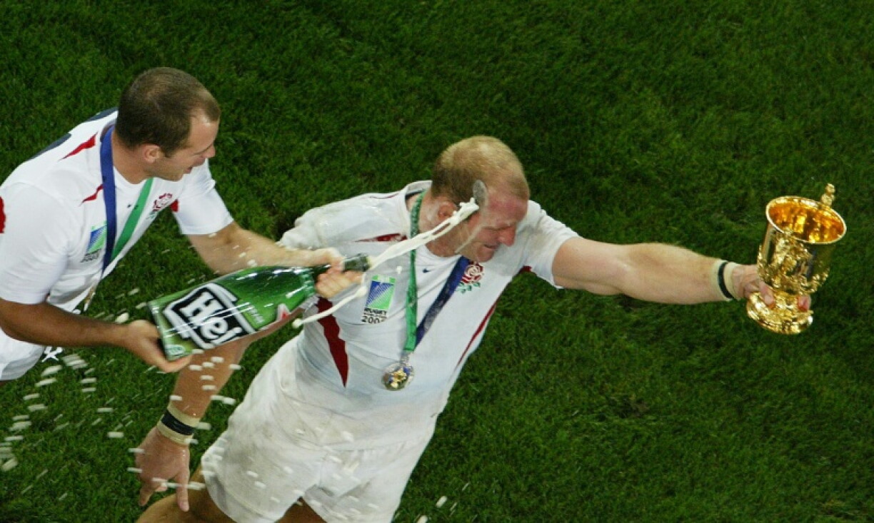 Lawrence Dallaglio holds the William Webb Ellis Cup after the 2003 Rugby World Cup final
