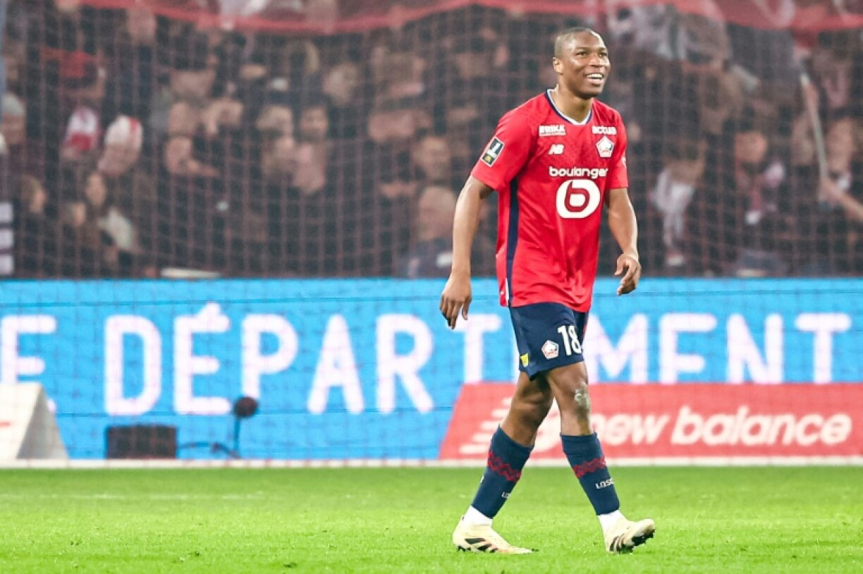 Bafode Diakite celebrates after scoring Lille's second goal in their win over Nice on Friday