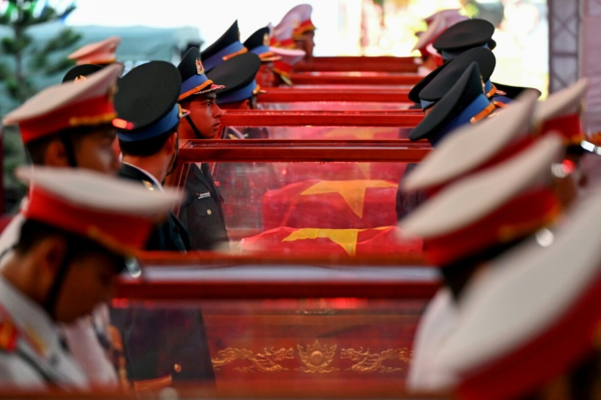 Vietnam held funeral rites for more than 700 of its war dead on October 14, unearthed in a major push to identify those missing from decades of conflict with France and the United States