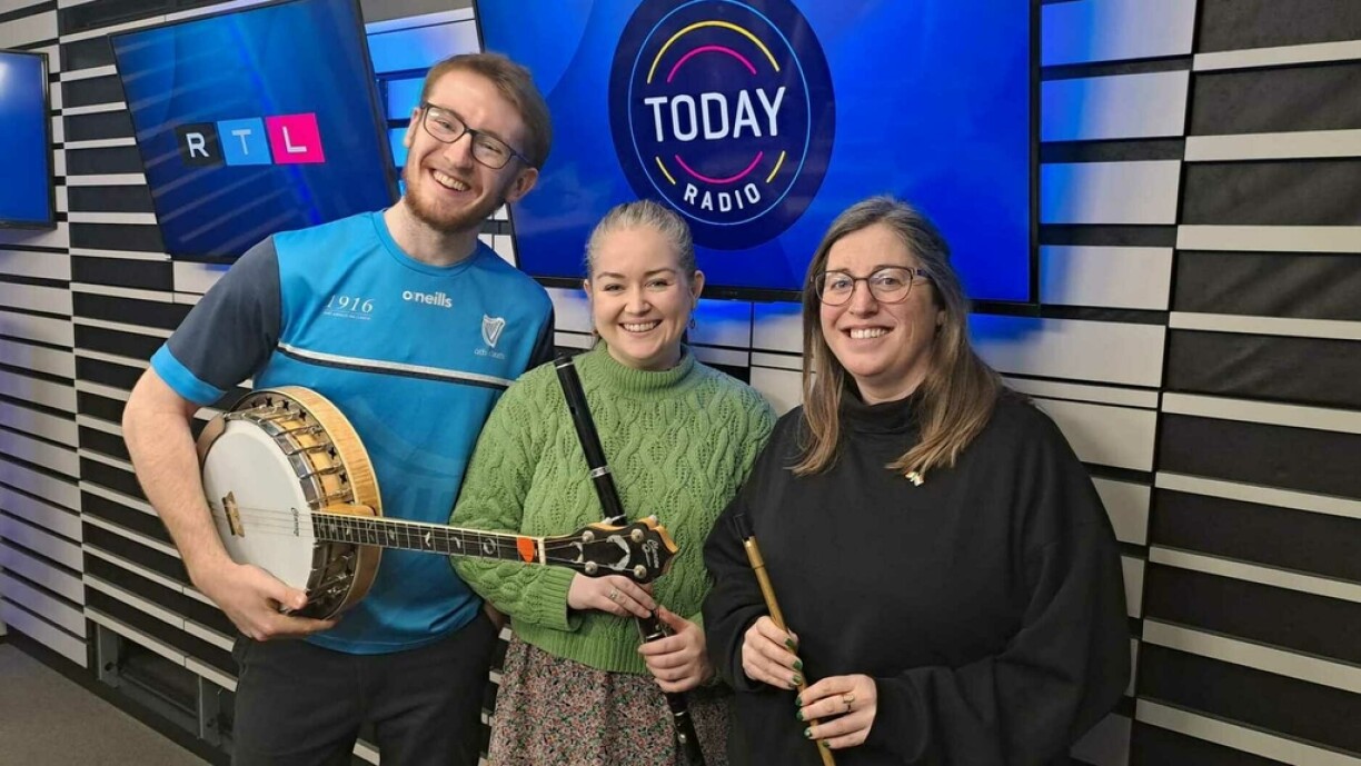 Edel tinkers on the the tin whistle, Cailín flourishes on the flute, and Liam blazes on the banjo.