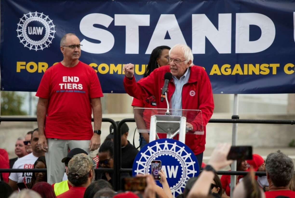 United Auto Workers President Shawn Fain, shown here in 2023 with Sen. Bernie Sanders, ripped GM's share buybacks as a giveaway to Wall Street