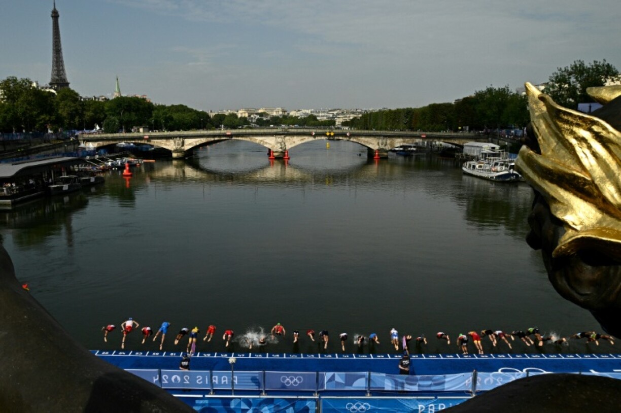 Olympic triathletes dive into the Seine last summer