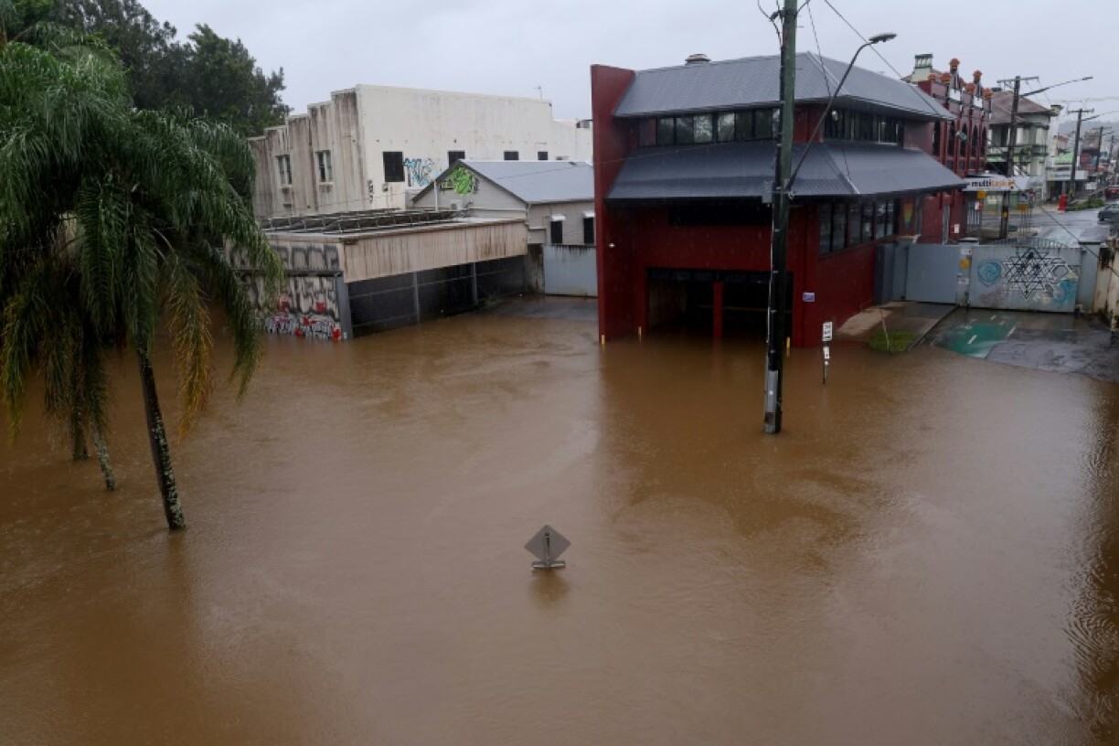 Floodwaters reach the levee walls protecting the city of Lismore on Australia's eastern coast