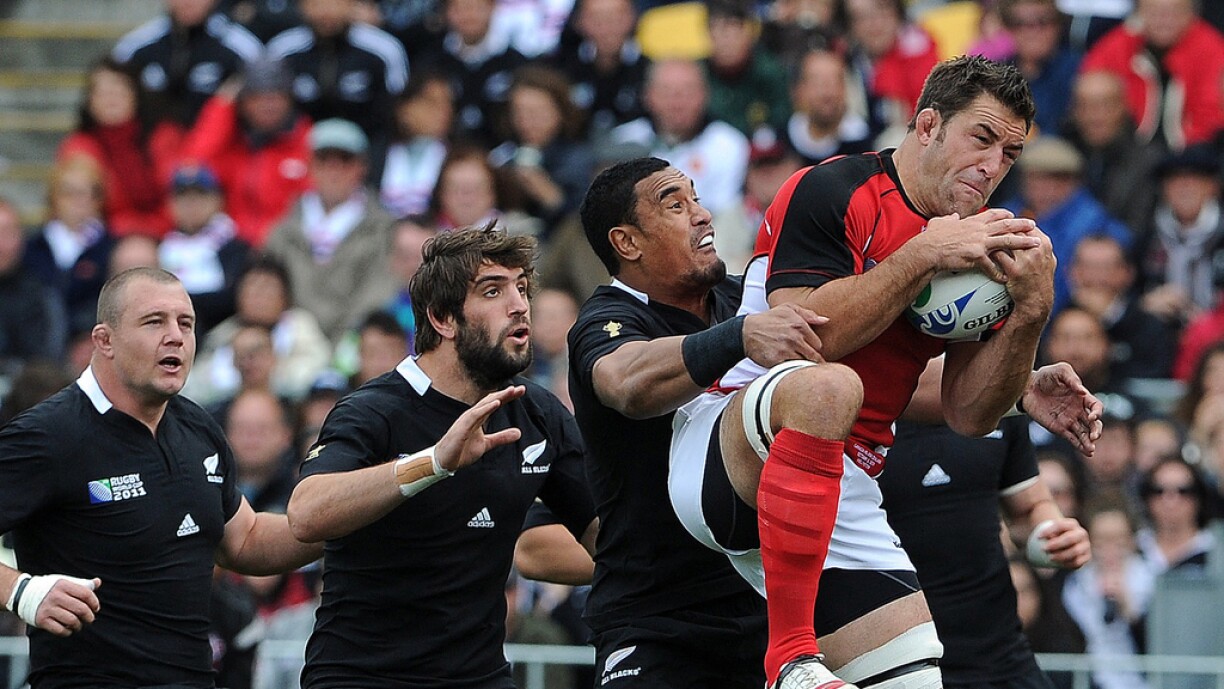 Canada's lock Jamie Cudmore (R) catches the ball next to New Zealand All Black flanker Jerome Kaino (2nd R), lock Sam Whitelock (2nd L) and prop Tony Woodcock during the 2011 Rugby World Cup pool A match New Zealand vs Canada at the Wellington Regional Stadium in Wellington on October 2, 2011
