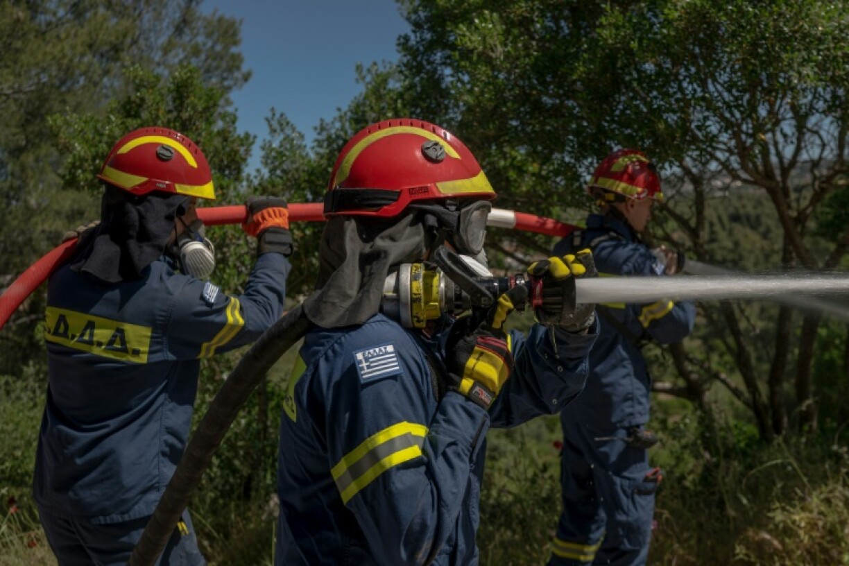 Volunteer firefighters are holding practice drills to prepare for fire season in the Athens suburbs