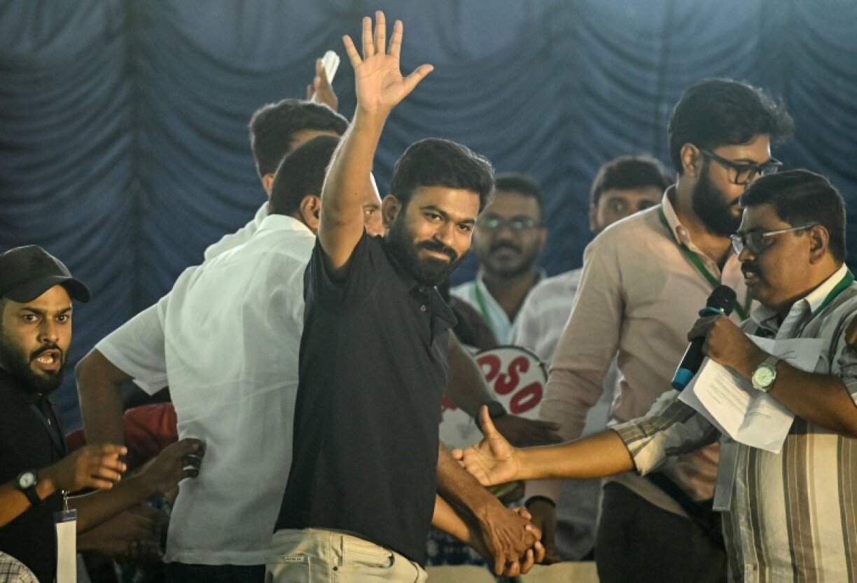 Cockroach Janta Party founder Abhijeet Dipke (C) was among several protest leaders detained ahead of Saturday's protest
