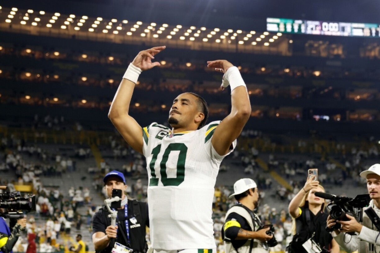 Green Bay Packers quarterback Jordan Love celebrates his team's NFL victory over the Washington Commanders