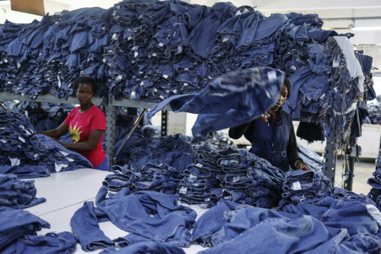 The United Aryan textile factory in Nairobi employs thousands of workers by selling jeans to the US