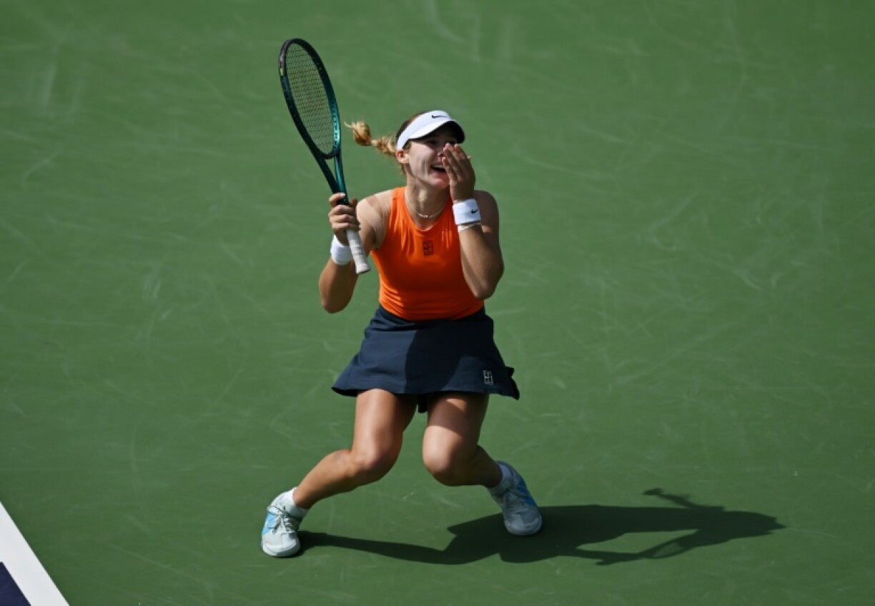 Russia's Mirra Andreeva celebrates her victory over world number one Aryna Sabalenka of Belarus in the Indian Wells WTA 1000 final