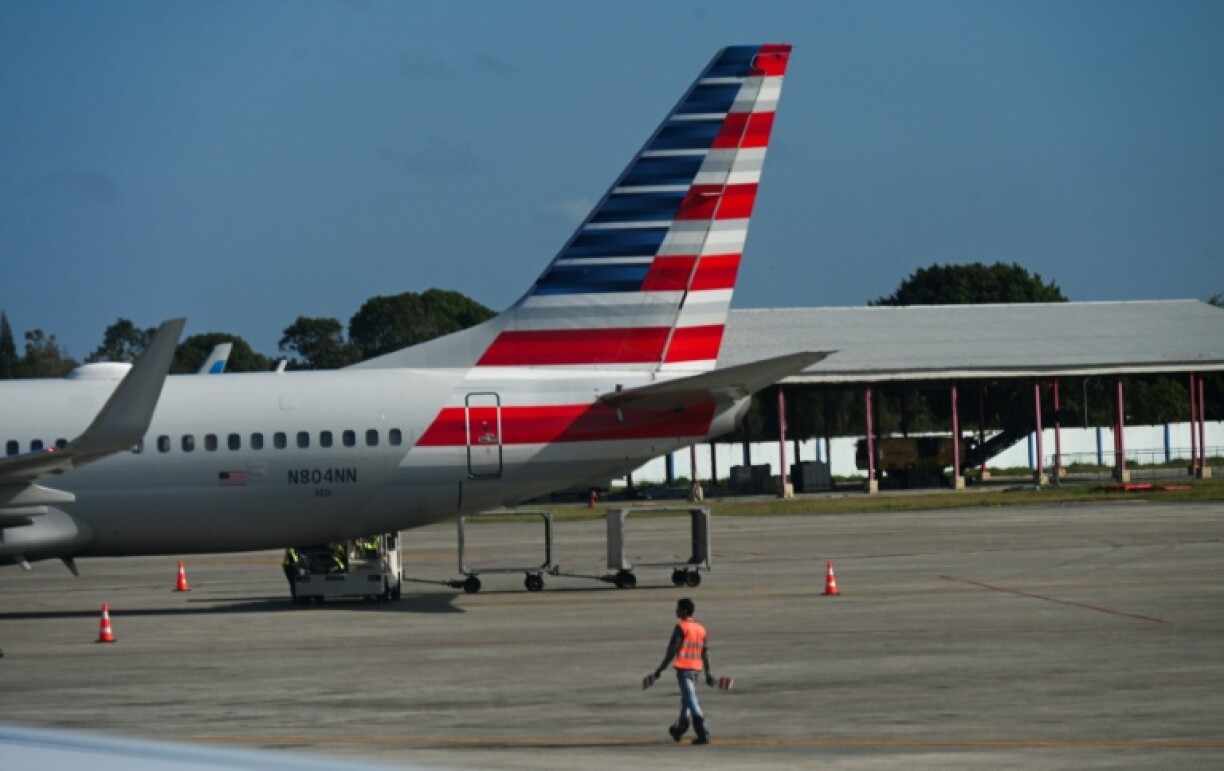 American said revenues were hit by economic uncertainty and fallout from the January 29 fatal crash of a regional jet operated by American Eagle at Ronald Reagan National Airport in Washington