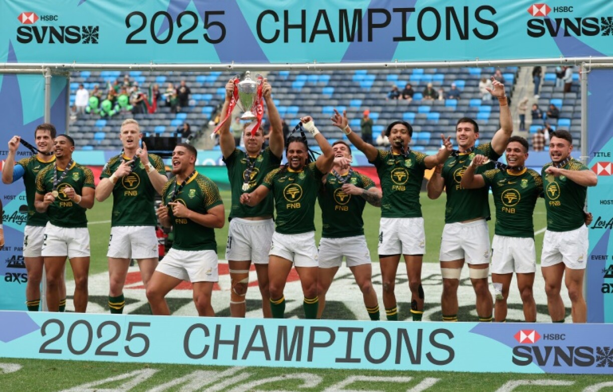 South Africa poses with the trophy after winning the Men's 2025 HSBC Rugby Sevens LA World Championship