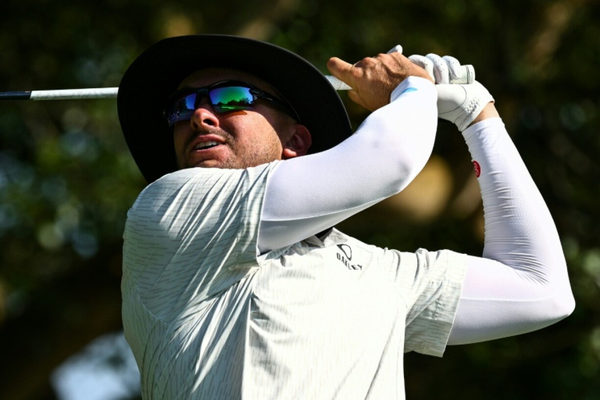 John Catlin tees off during round 2 in Hong Kong