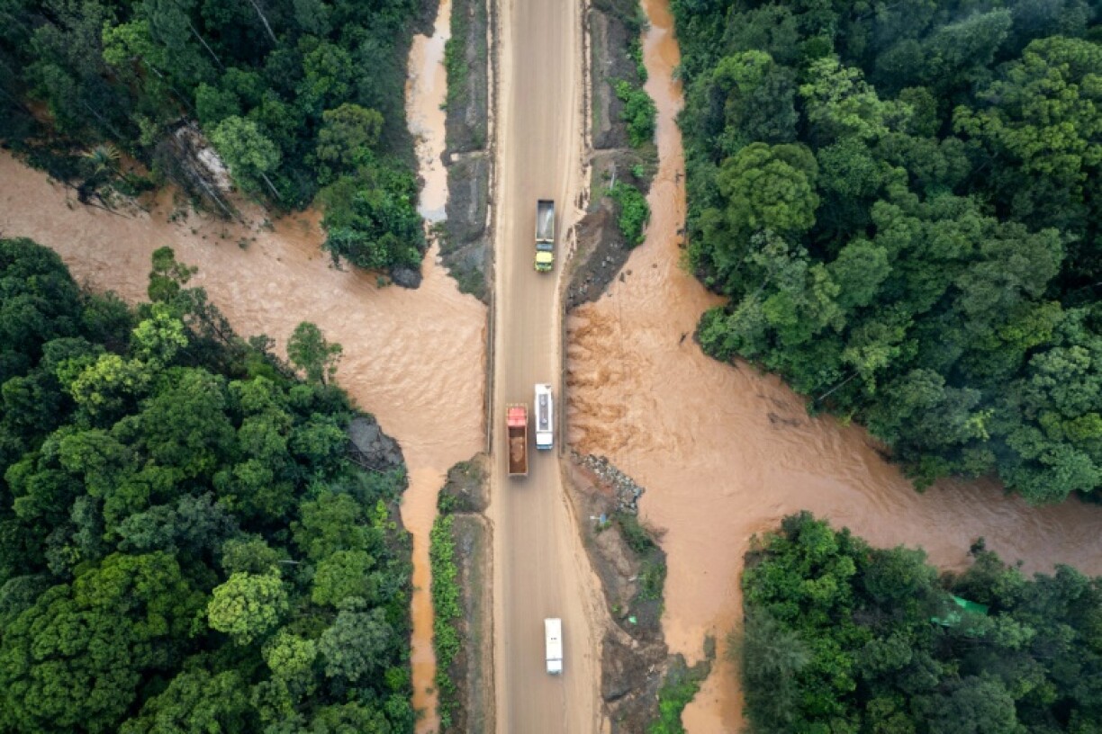 Locals say mud stirred up by mining has stained rivers copper, and the water leaves skin irritated