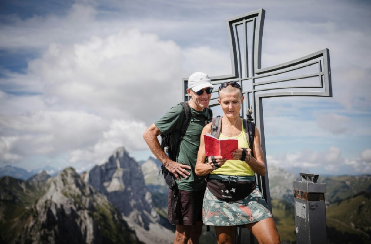 Patrick and Cathy, both 58, met through Mountain Tinder -- messages left in a red notebook on a Swiss Alps summit