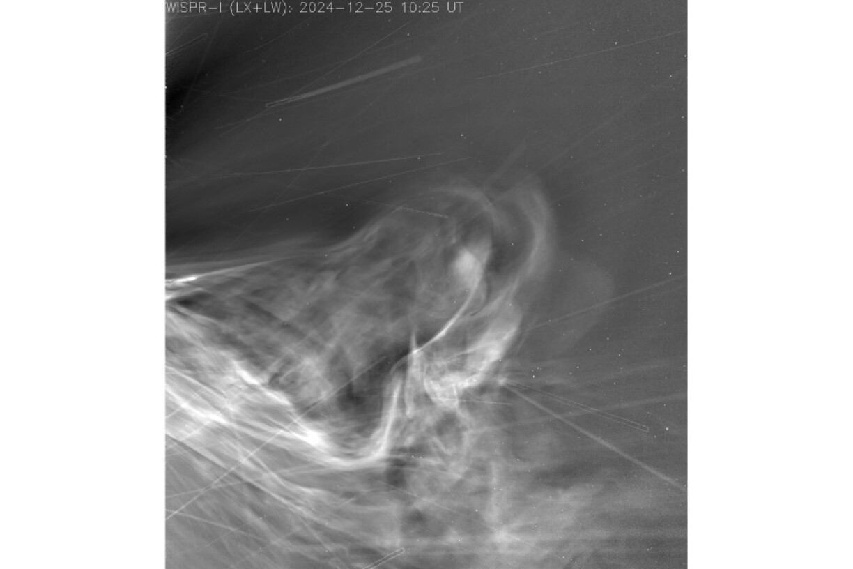 This photo provided by NASA on July 15, 2025, was taken by Parker Solar Probe's WISPR instrument during its record-breaking flyby of the Sun, showing the solar wind racing out from the Sun's corona, or outer atmosphere