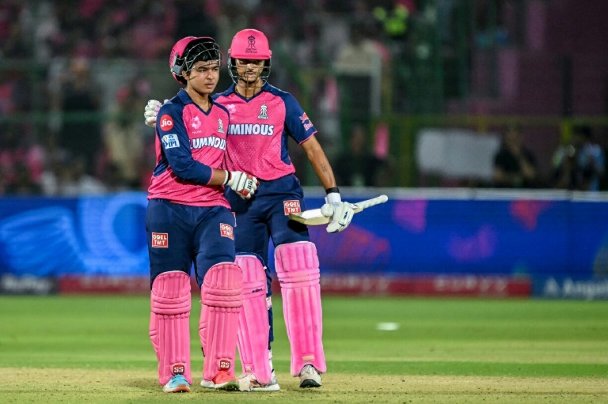 Vaibhav Suryavanshi (L) is consoled by Rajasthan team-mate Yashasvi Jaiswal after falling for at the end of a record-breaking century