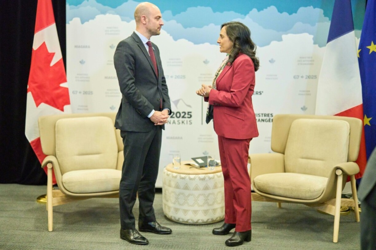 Canadian Foreign Minister Anita Anand (R) greets her French counterpart Jean-Noel Barrot at the G7 foreign ministers meeting in Niagara-on-the-Lake