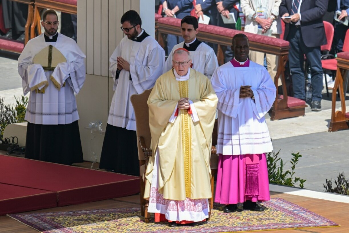 Cardinal Pietro Parolin (C) played a key role in mediating a thaw between the United States and Cuba, as well as making a key Vatican agreement with China