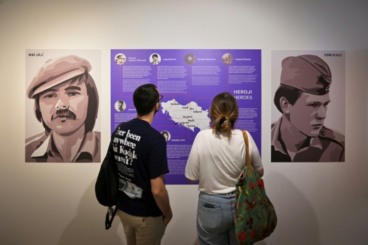 The heroics of Bosnian Croat 'Neđo' Galic (L) and Bosnian Serb Srdan Aleksic, who tried to save their neighbours, are featured in the exhibition