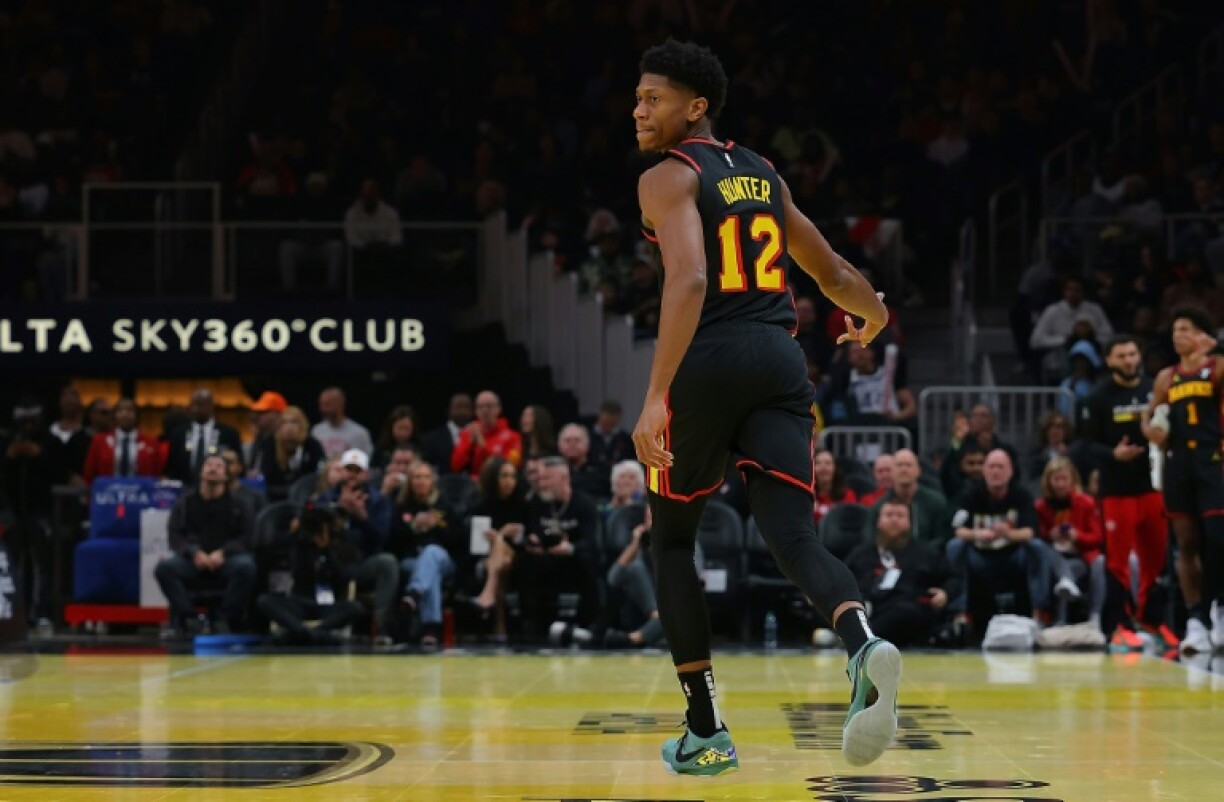 De'Andre Hunter of the Atlanta Hawks reacts after a three-point basket in an NBA victory over the Cleveland Cavaliers