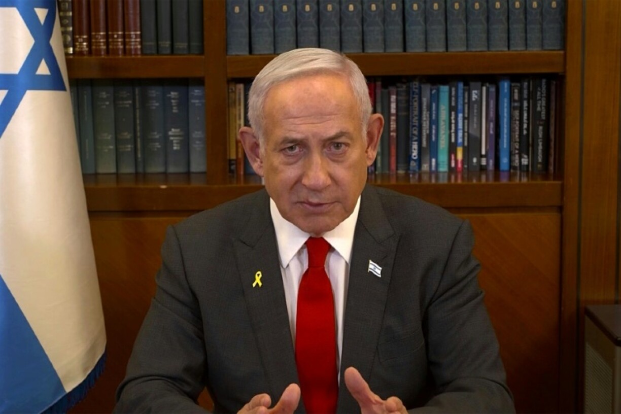 Israeli Prime Minister Benjamin Netanyahu addresses the nation on Saturday on the eve of the start of the Gaza truce.