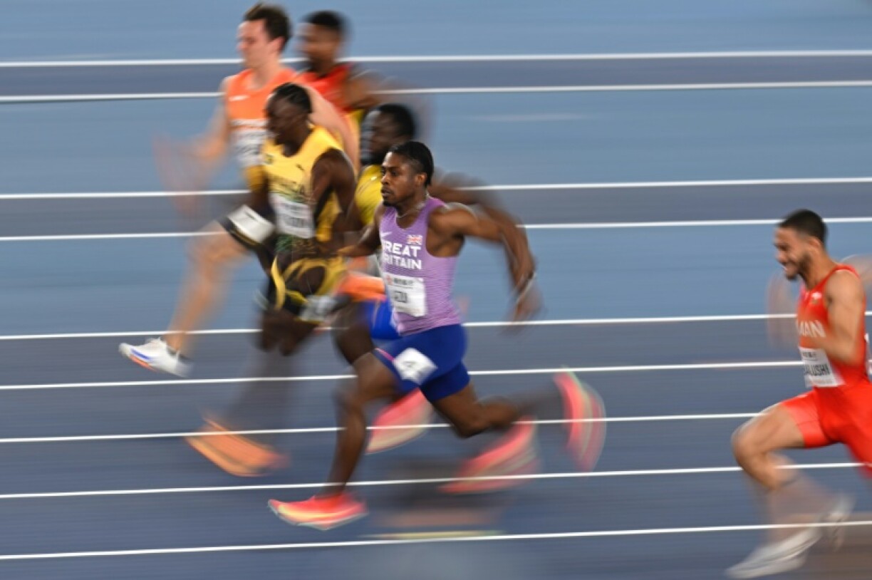Jeremiah Azu winning his 60m semi-final Friday on the wau to a world title in Nanjing