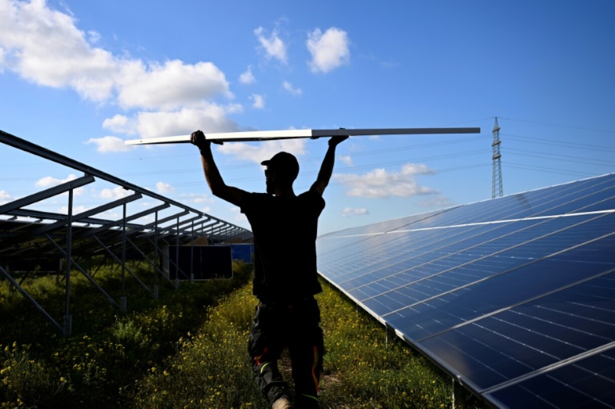 A worker at a solar power park near Erftstadt, western Germany