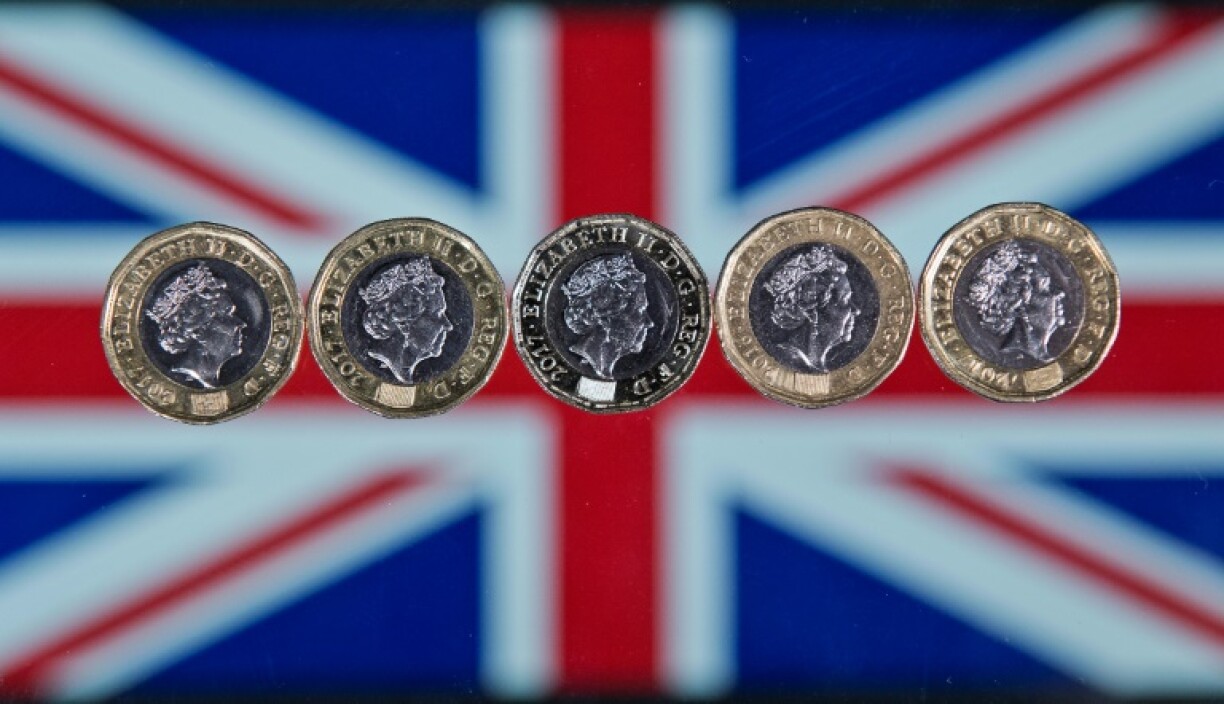The British pound slumped against the dollar after the Bank of England cut interest rates