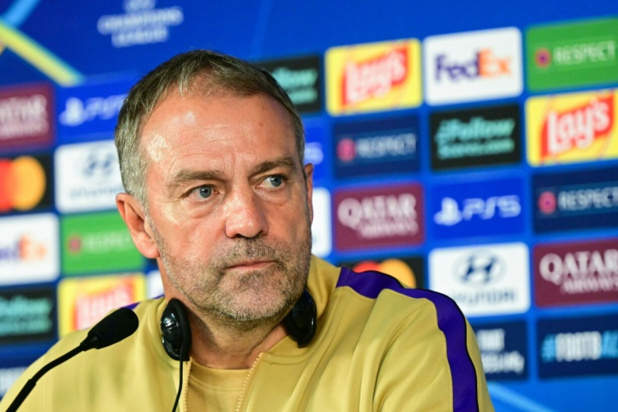 Barcelona's German coach Hansi Flick speaks during a press conference at Rams Park Stadium in Istanbul