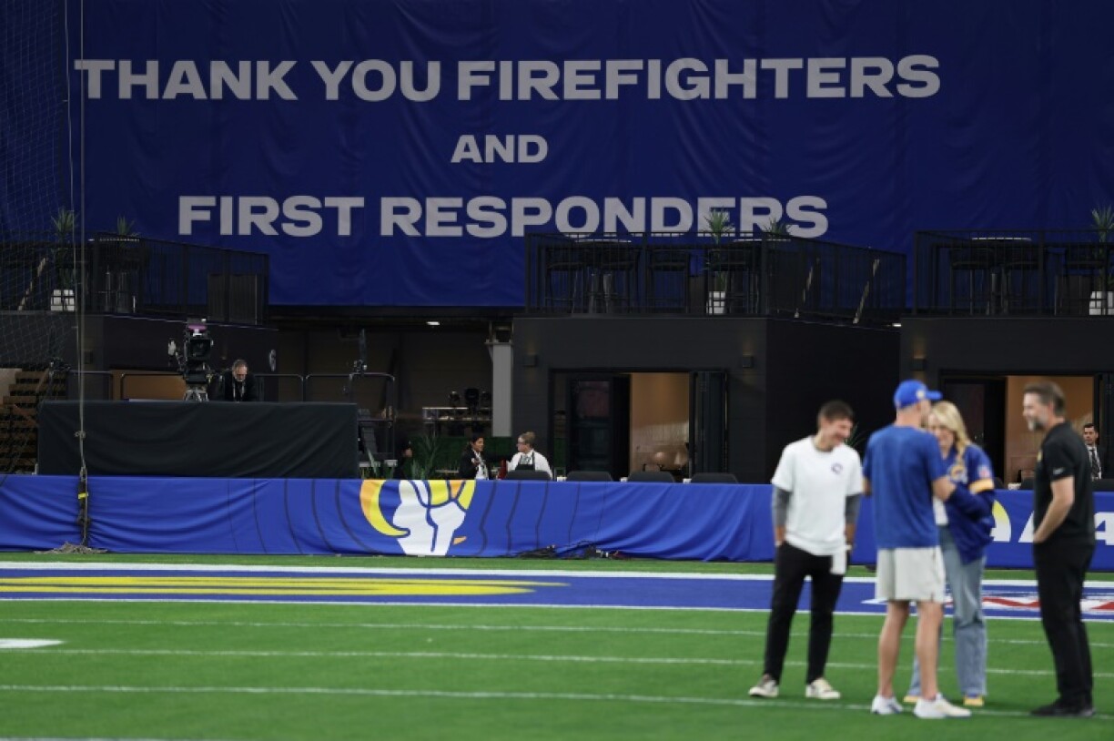 A Thank You to Los Angeles firefighters and first responders sign at the Los Angeles Rams' NFL playoff game against Minnesota, which was moved to Arizona because of the destructive wildfires in California