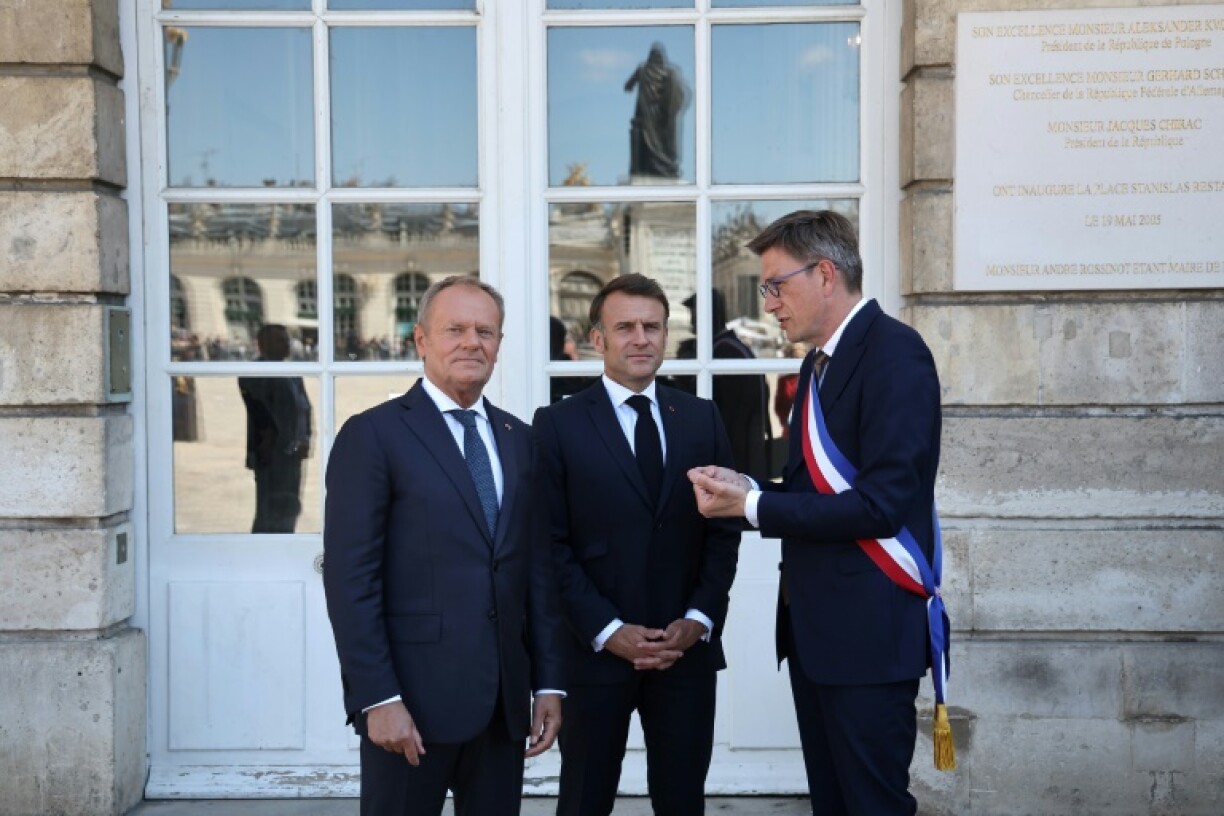 The treaty, signed in the French city of Nancy, contains a key defence clause