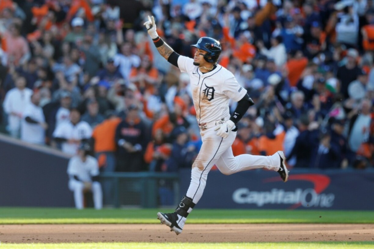 Detroit's Javier Baez celebrates his two-run home run in a victory over the Seattle Mariners in their MLB playoff series