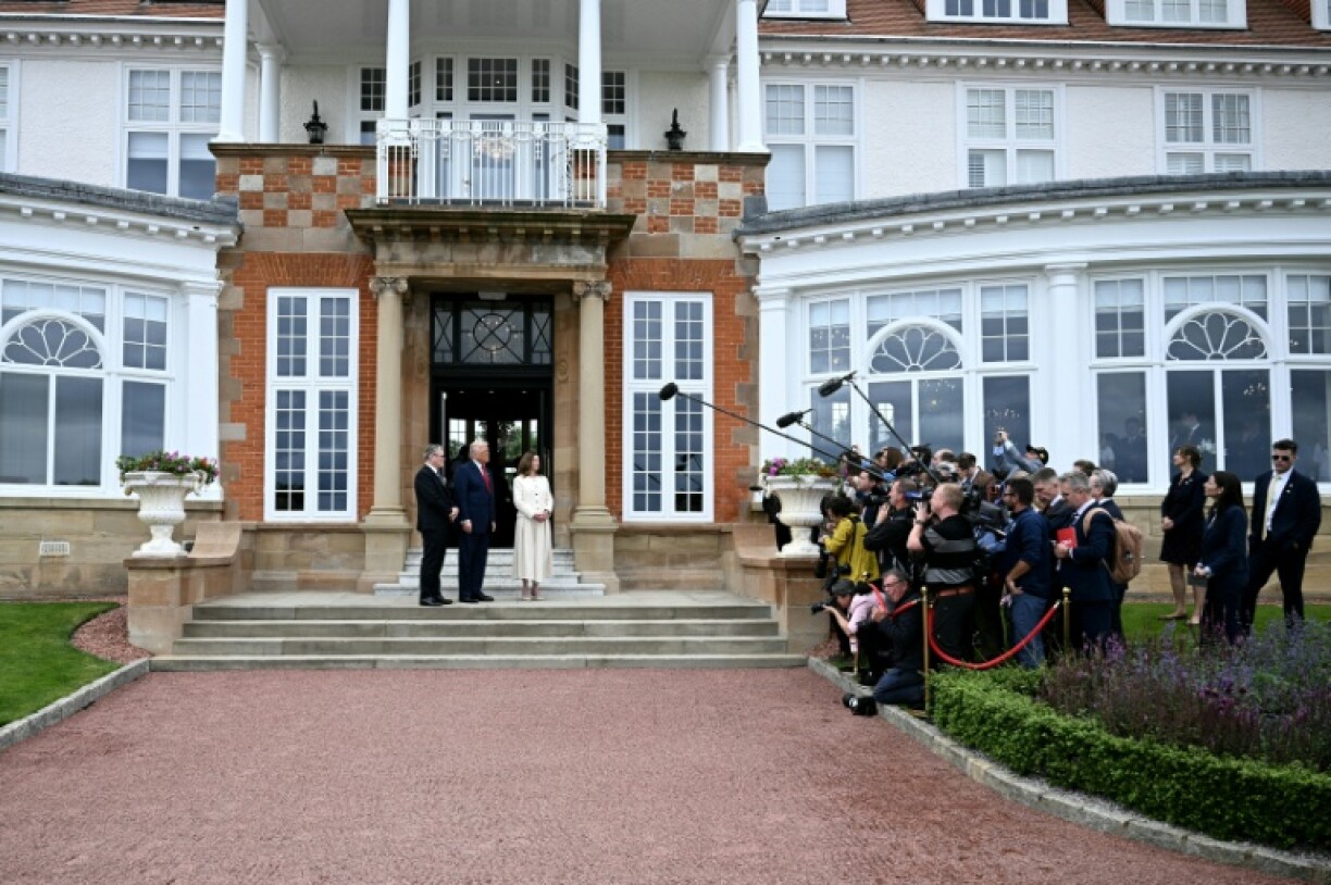 US President Donald Trump welcomed UK Prime Minister Keir Starmer to his luxury golf resort in southwestern Scotland in front of the glare of the media