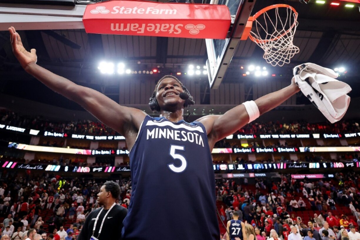 Anthony Edwards of the Minnesota Timberwolves celebrates a come-from-behind NBA victory over the Houston Rockets