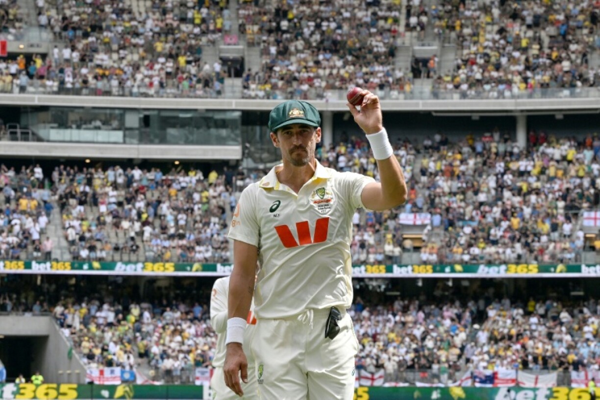 Australia's Mitchell Starc celebrates took seven wickets in the first Ashes Test