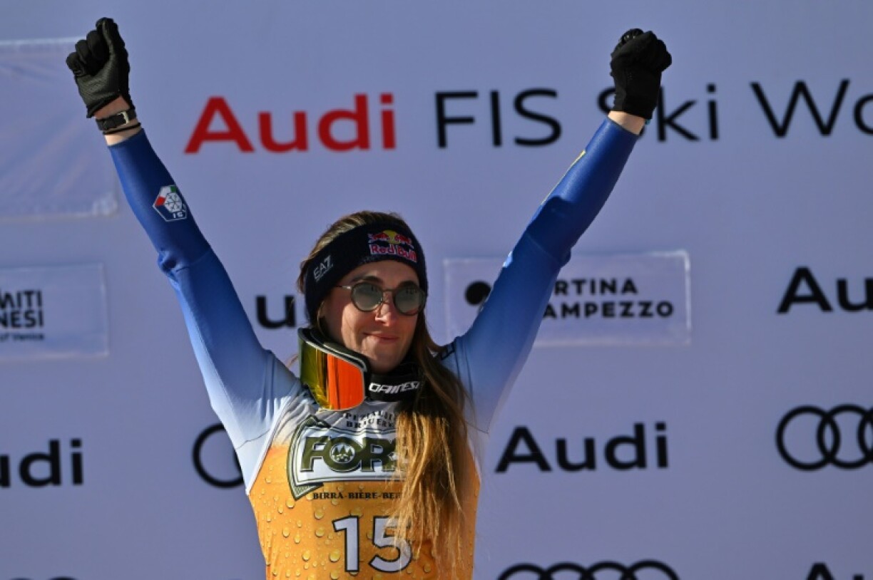Sofia Goggia on the podium after winning the World Cup downhill at Cortina d'Ampezzo last month