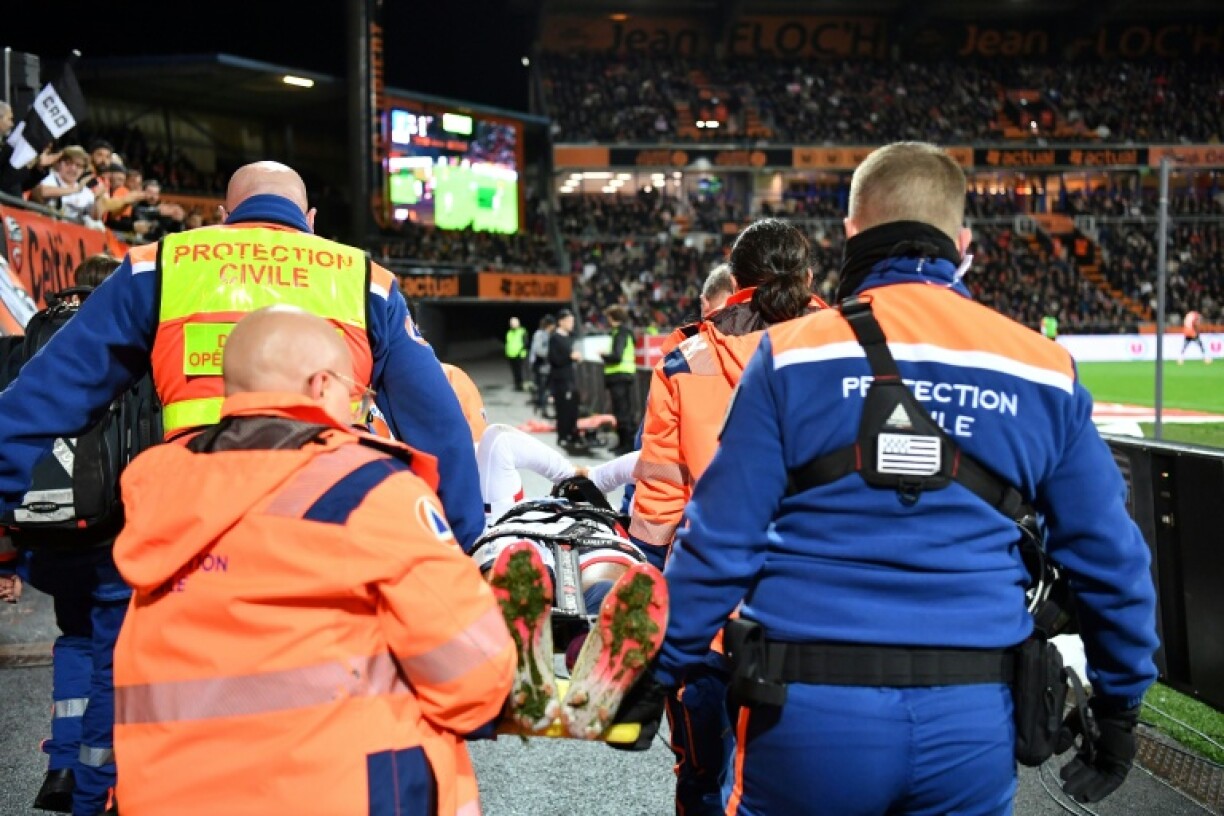 Desire Doue fell to the ground grimacing with a right thigh injury on the hour mark, before being stretchered off