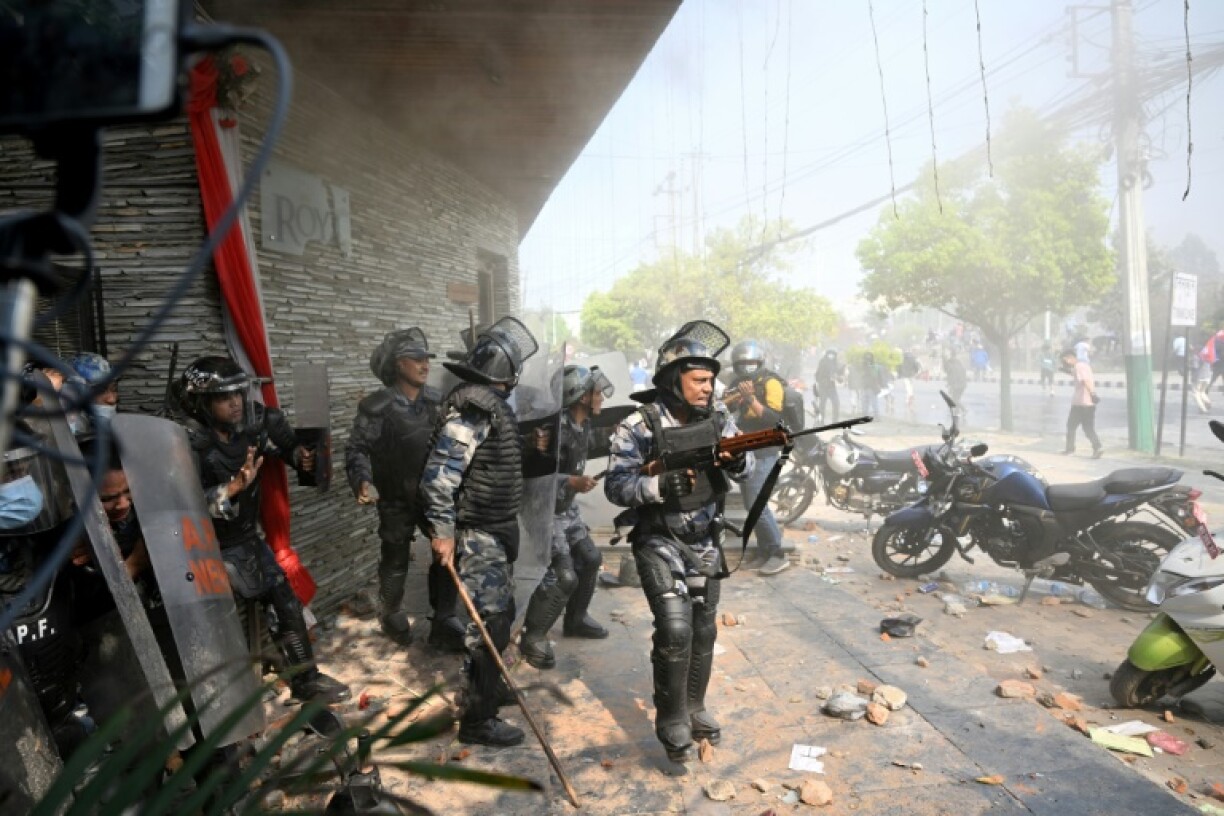 Nepal police fire tear gas to disperse pro-monarchy demonstrators in Kathmandu