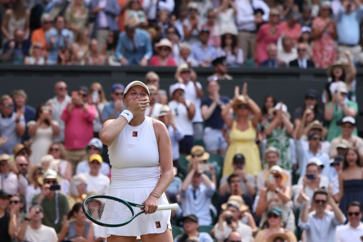 Amanda Anisimova celebrates reaching the Wimbledon final