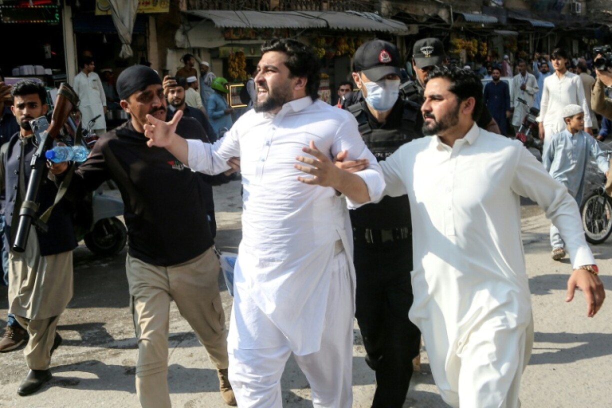 Pakistani authorities have detained hundreds of members of jailed former prime minister Imran Khan's party after emergency rule was imposed in a northern province, police sources say