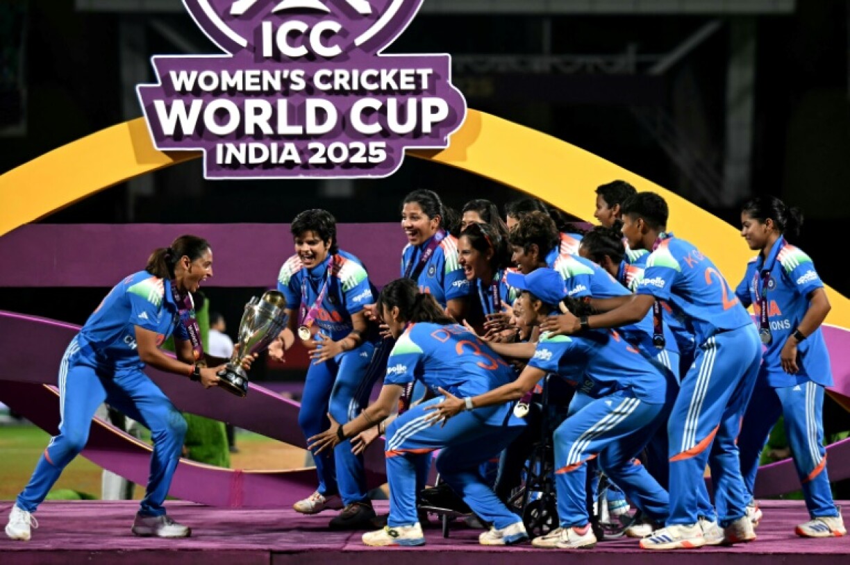 India's players celebrate after winning the ICC Women's Cricket World Cup 2025