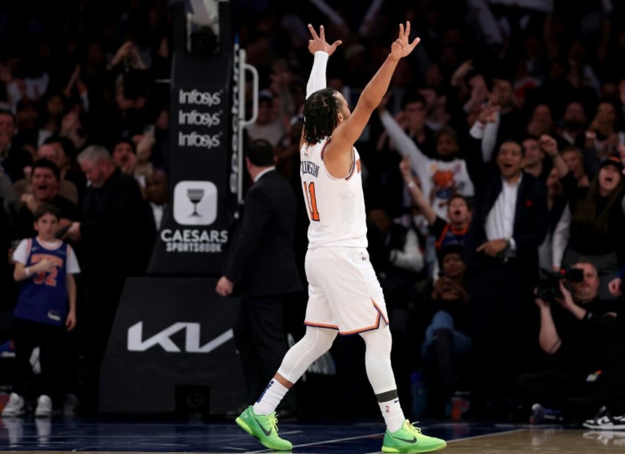 Jalen Brunson salutes the crowd after inspiring a fourth quarter comeback in the New York Knicks' victory over the Houston Rockets
