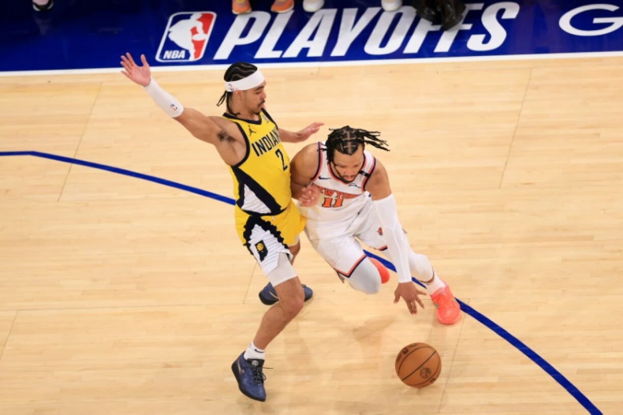 Jalen Brunson (right) drives past Andrew Nembhard in the New York Knicks win over the Indiana Pacers